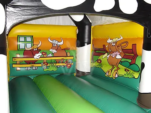Cow roofed inflatable bounce