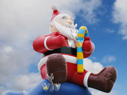 Santa Claus roofed inflatable bounce