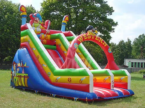 Western saloon-themed inflatable slide