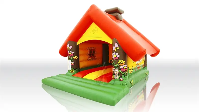 Hut with a chimney commercial inflatable bounce