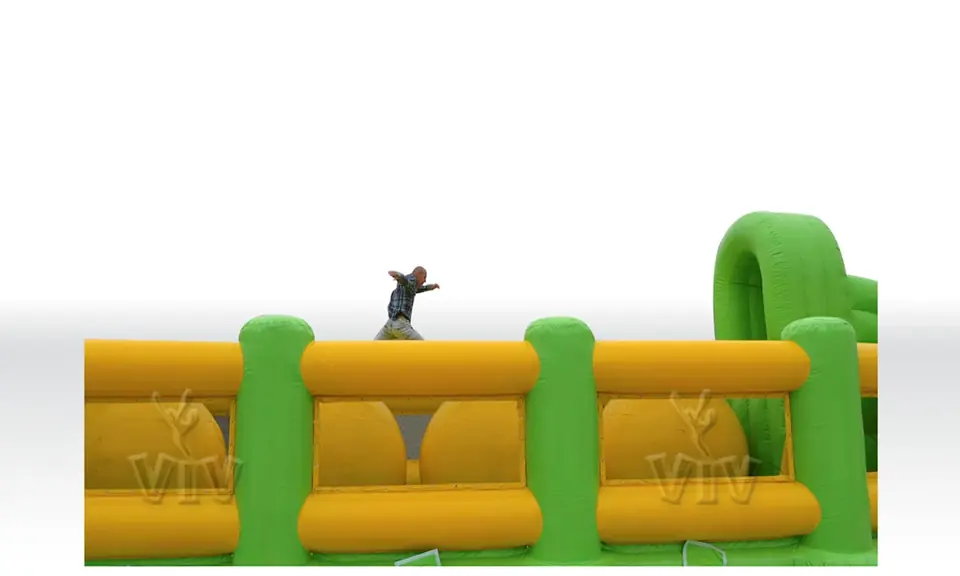 Wipe-Out with Barrier Green and Yellow commercial inflatable wipe-out attraction