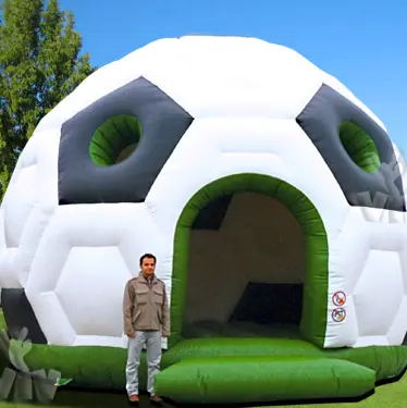 Football themed roofed inflatable bounce