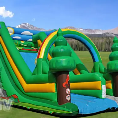 Forest-themed inflatable slide with tree motifs